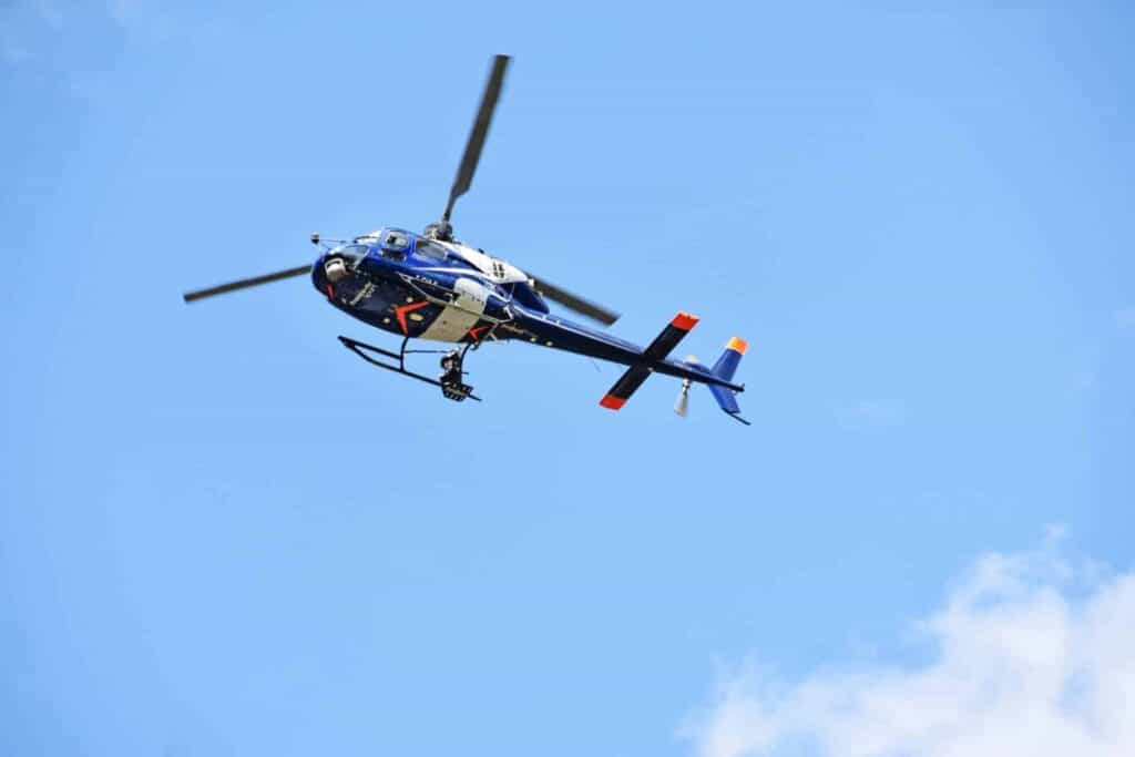 There’s no hiding the leaders coming on the Tour as a fleet of helicopters announce their arrival! - Photo credit: Tim Andrews