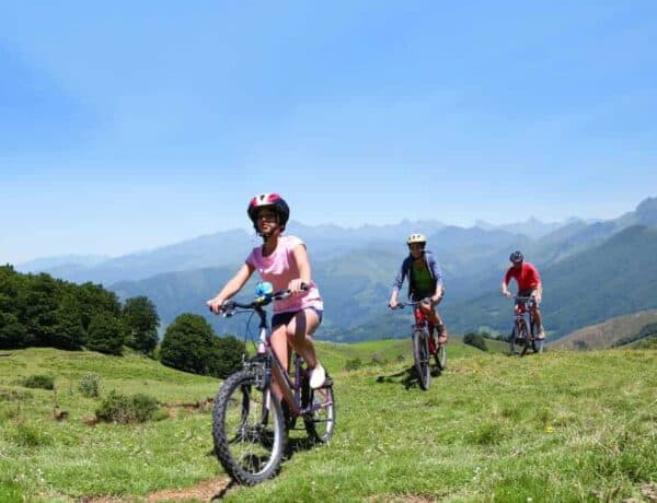 A family riding on the La Clusaz Mountain bike trails