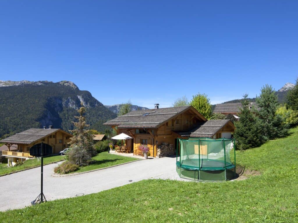 Child friendly ski chalets - with trampoline and basketball hoop.