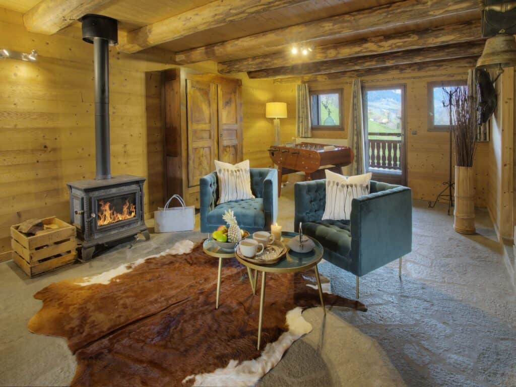 Cosy living room with armchairs and fireplace