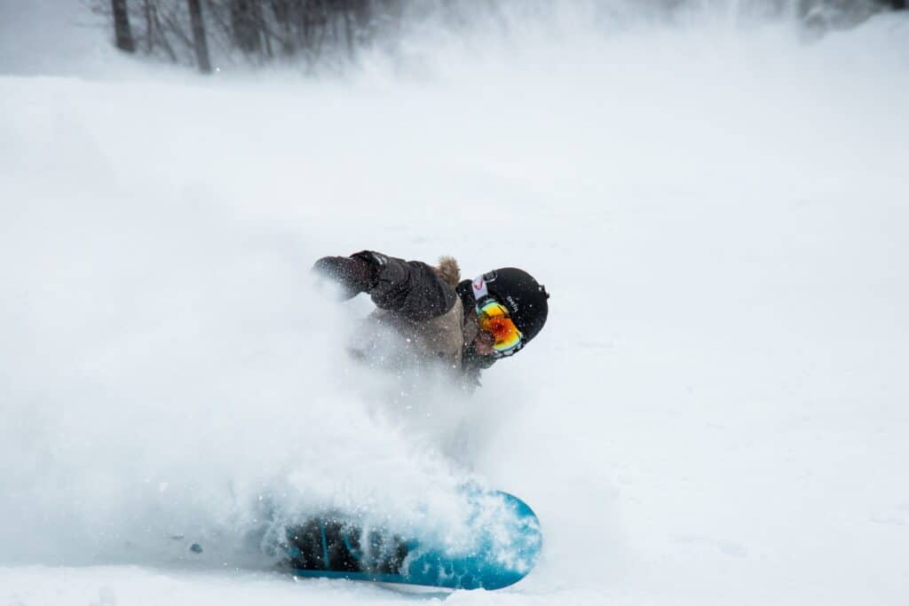 is skiing or snowboarding easier