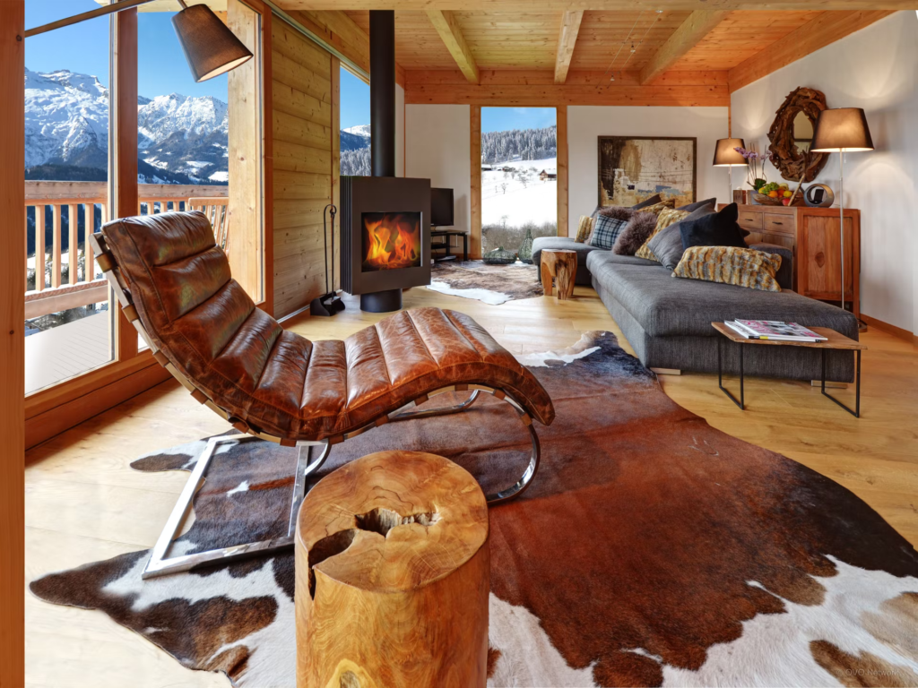 alpine-sitting-room-animal-rugs-reading-chair-chocolat-manigod