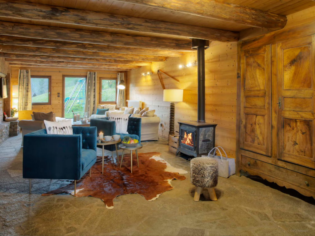 stone-floor-chalet-lotavalo-sofas-armchairs-cosy-fire-armoire