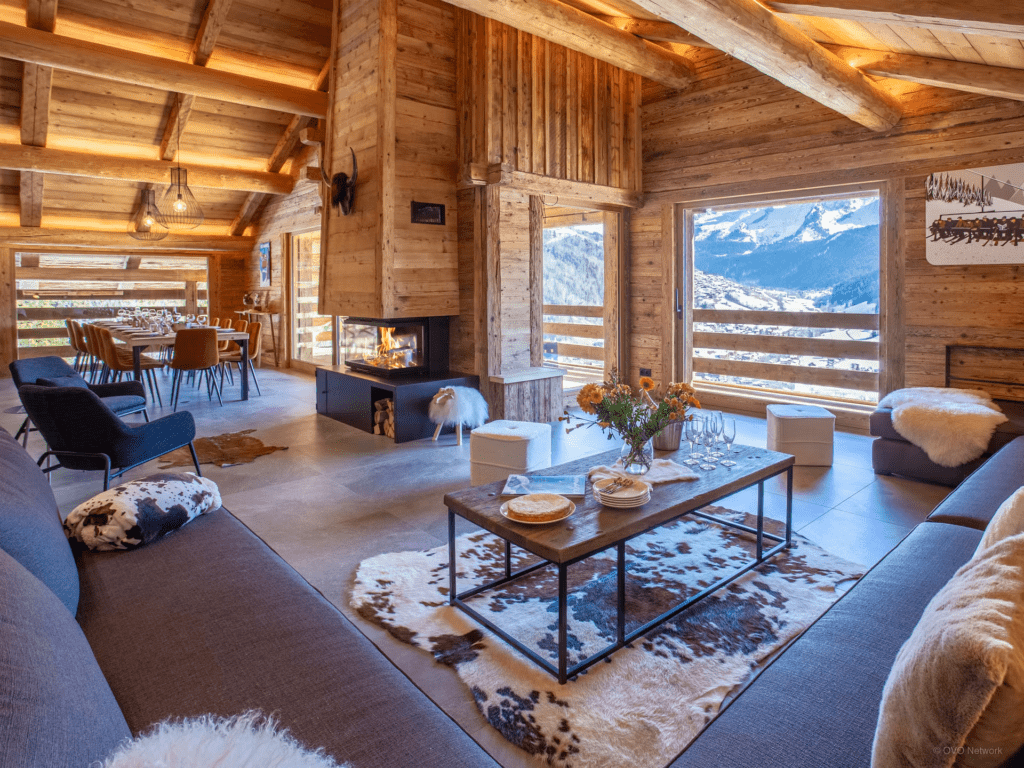 chalet-happyview-lounge-open-plan-large-sofa-views-natural-alpine-style