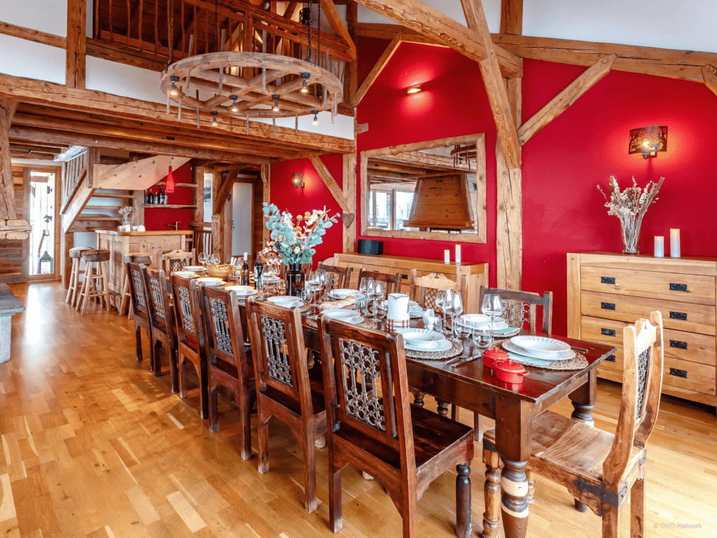 chalet-keramis-rich-red-traditional-dining-room-large-table-and-bar