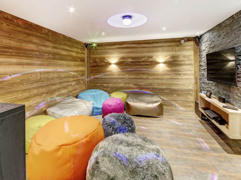 Chalet Caramel home cinema with bean bags and disco lights