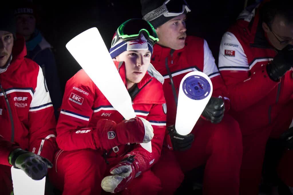 ESF instructors preparing for the torchlit descent