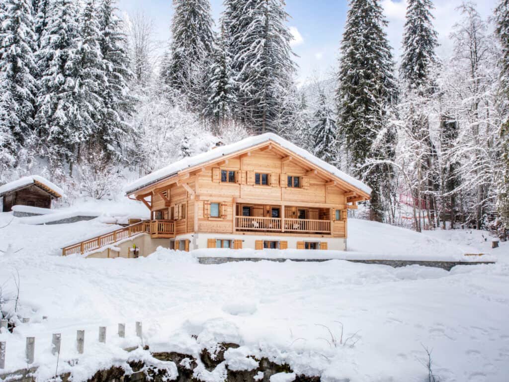 Chalet Riparian set in snowy woodland