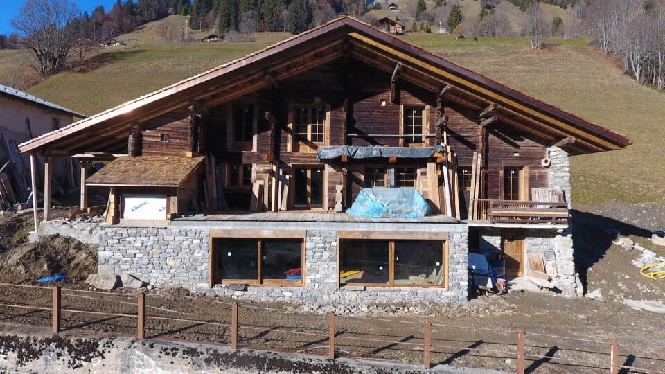 The old farmhouse during its renovation into a luxury Alpine chalet
