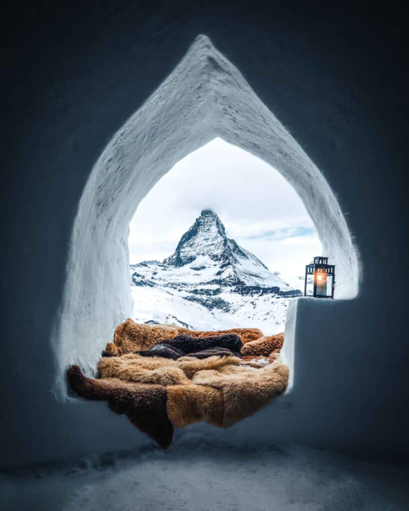 A view of a mountain, seen from a cosy igloo