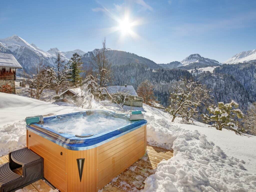 Hot tub with sunny mountain views