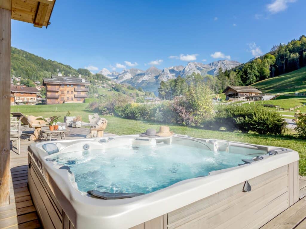 Hot tub with summer mountain views