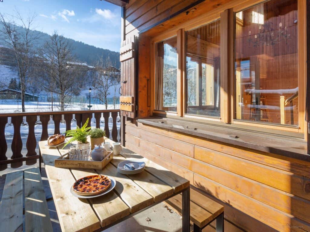Exterior shot of the sunny terrace at Chalet Bellanis in Morzine