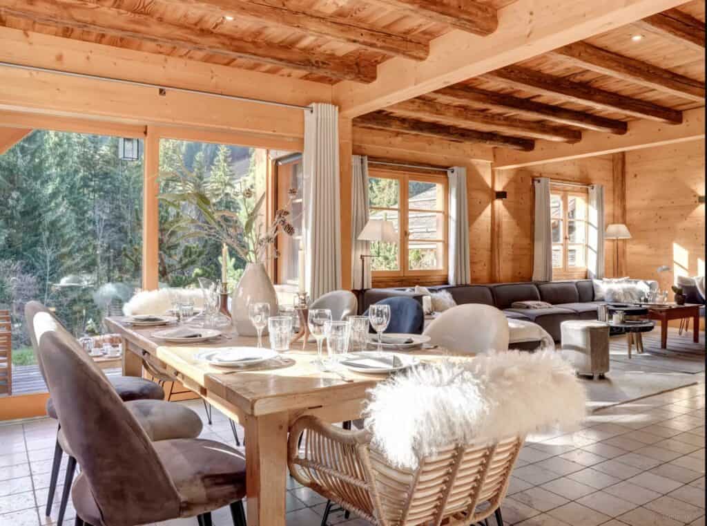 The dining area at Chalet Hollygotty with the seating area in the background