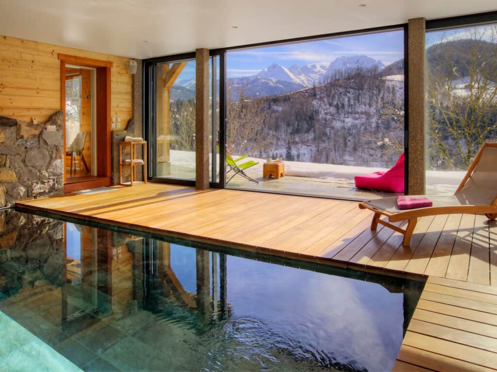 The indoor pool at Lodge La Source, opening out on to the terrace