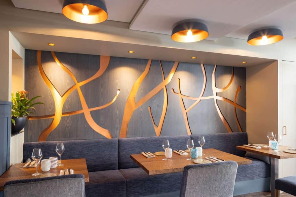The interior of the restaurant with grey as the dominant colour and wood to reflect the chef's love of nature.