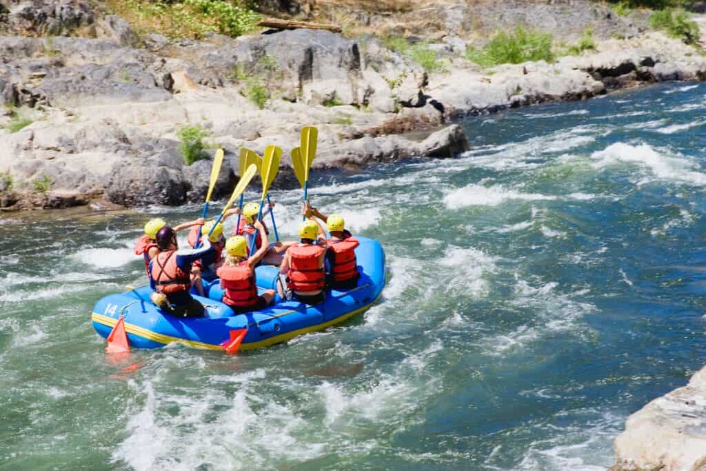 A group whitewater-rafting in the Alps