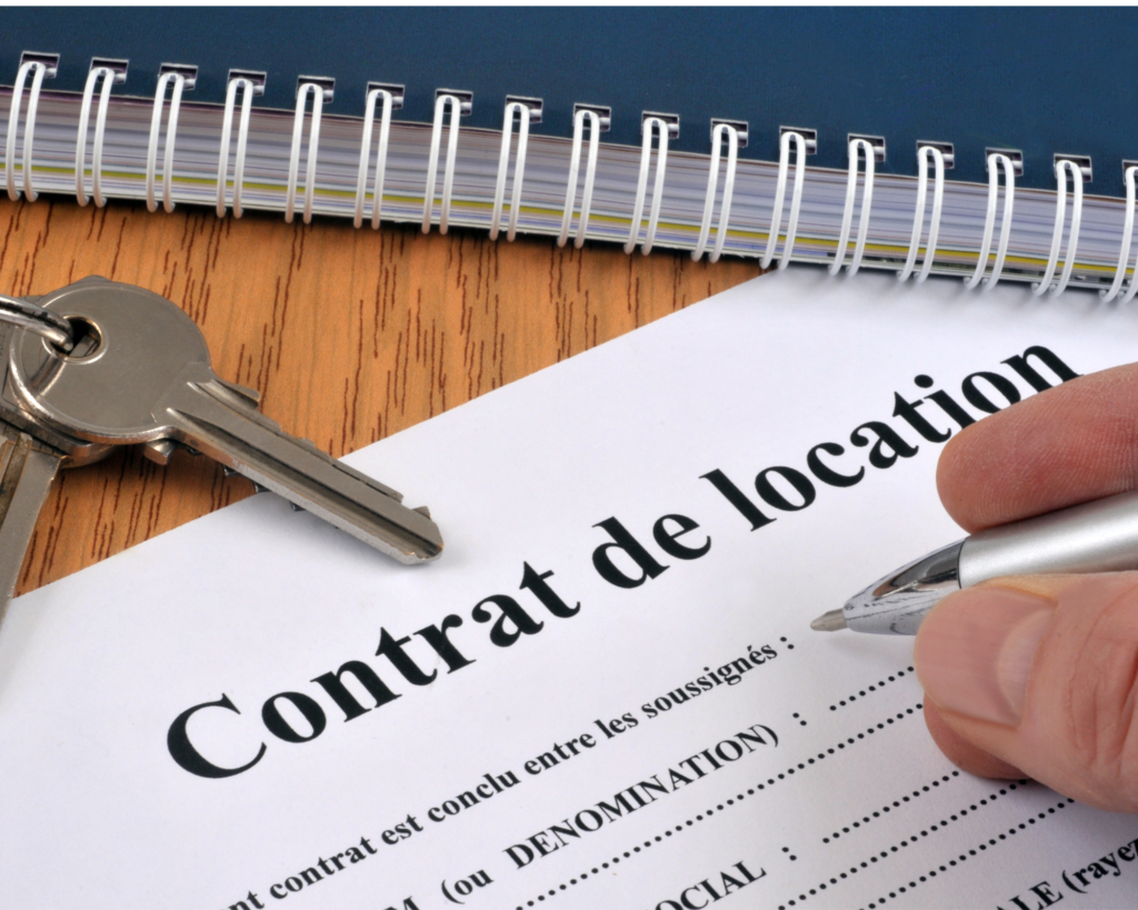 A person fills in a rental contract form
