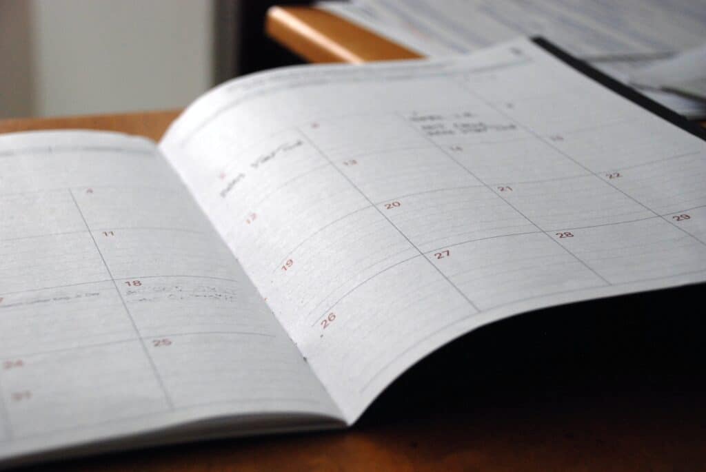 A booking diary open on a table