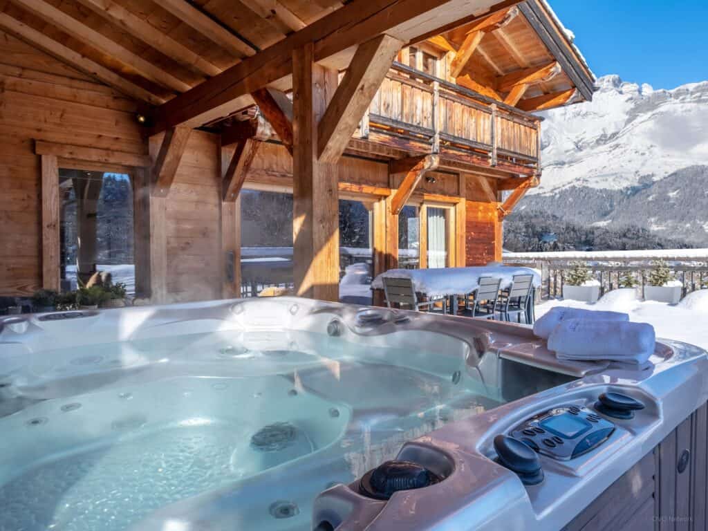 The hot tub on the terrace of the luxury Chalet Les Vosnes, in Combloux. 