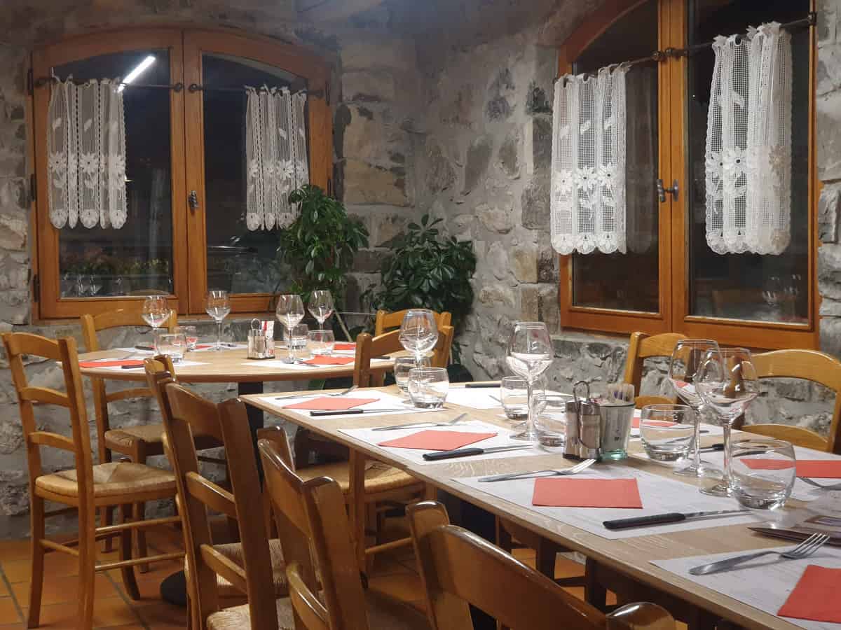 Tables ready for dinner at a traditional mountain restaurant