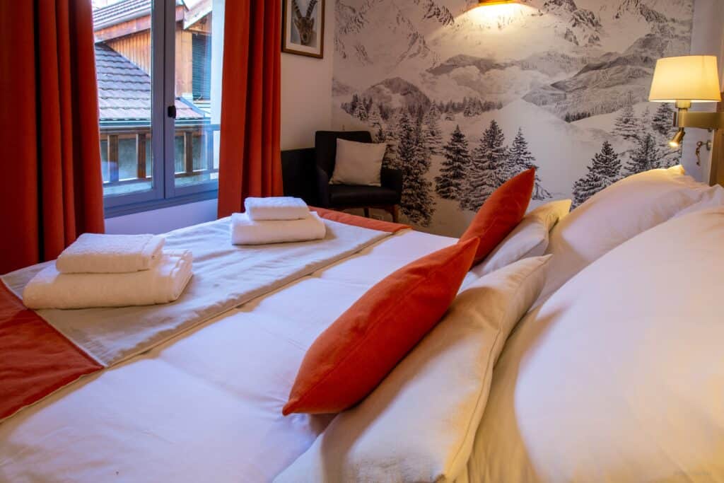 The bedroom at Le Petit Swan Doors, Annecy. 
