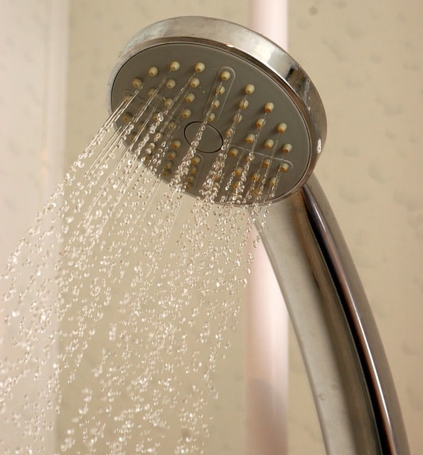Water runs out of a shower head