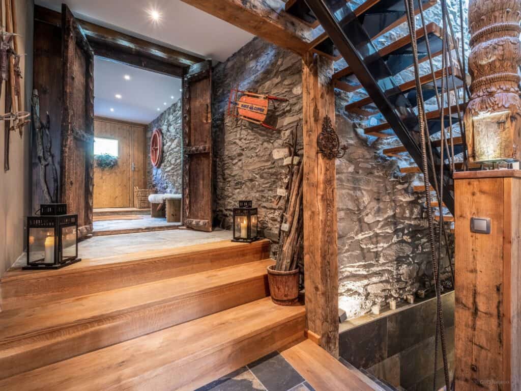 The hallway of a home with rustic mountain accents