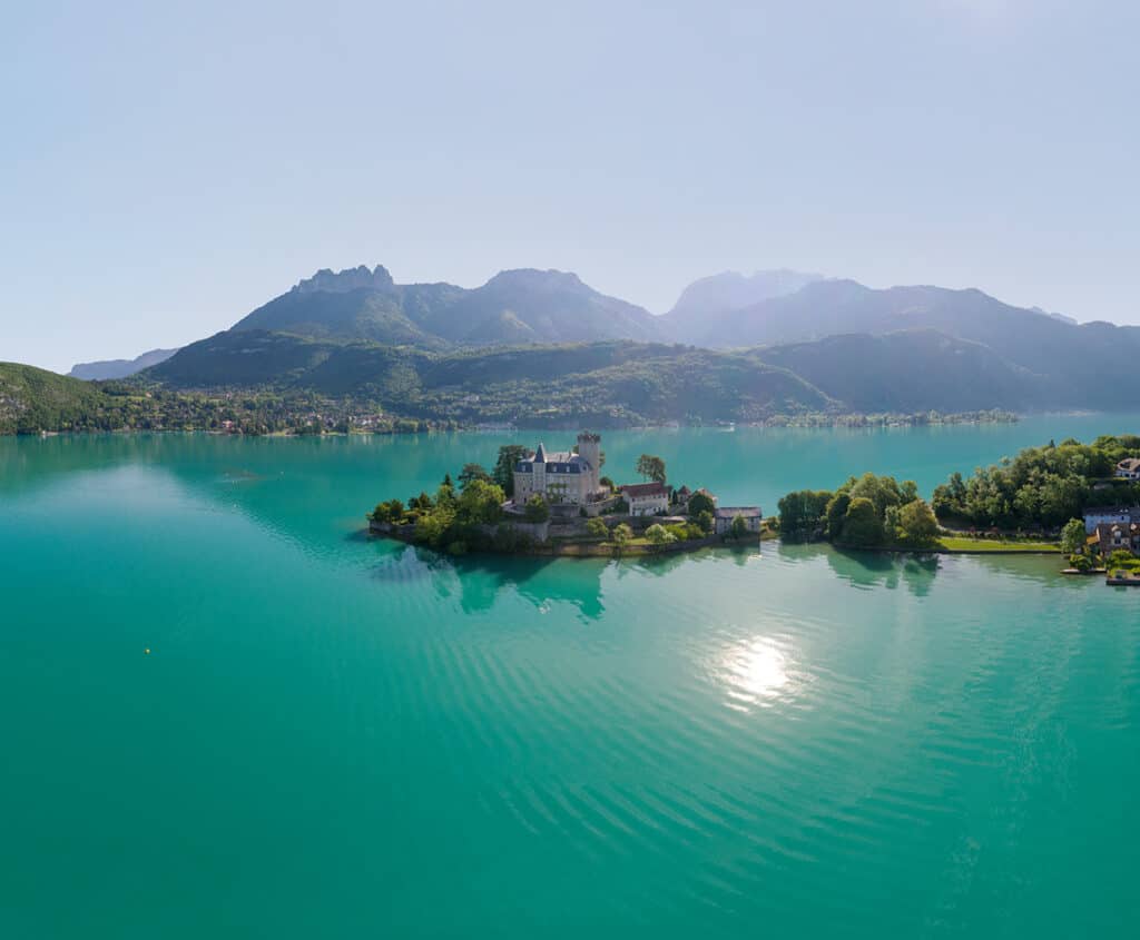 Bird's-eye view of the Duingt castle, in the middle of Lake Annecy.