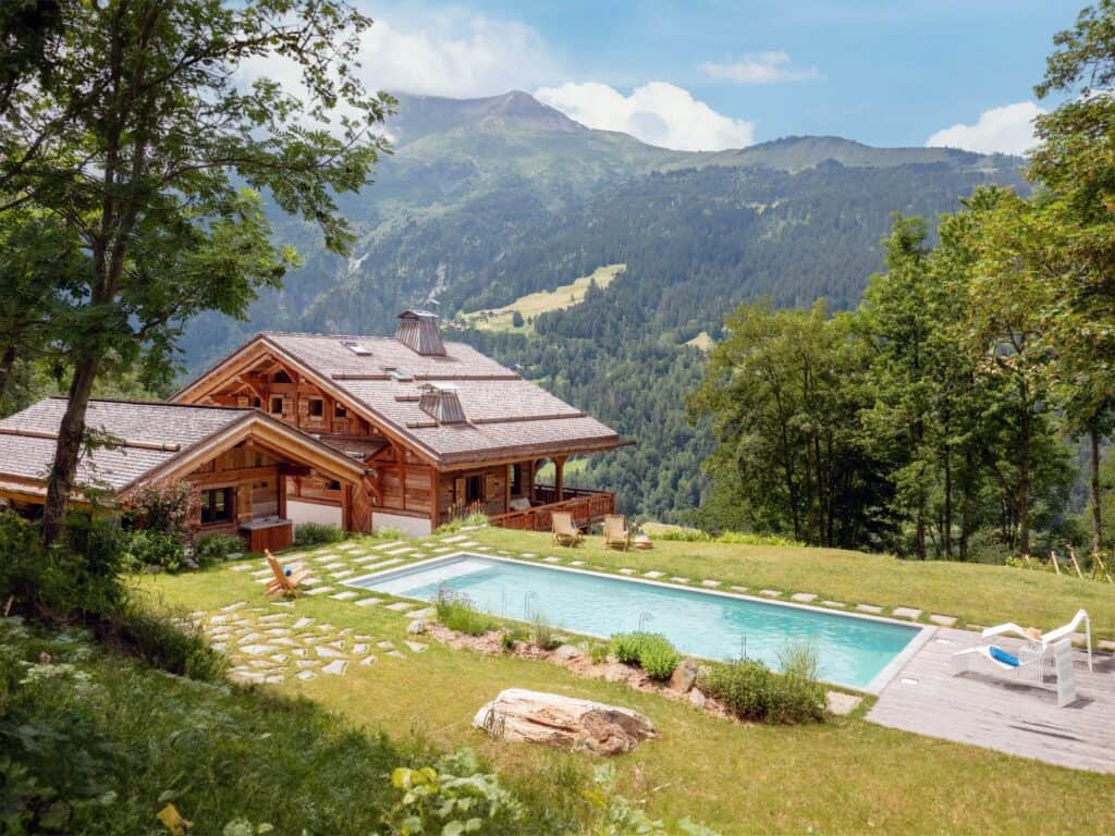 Chalet Beau Caillou, Saint Gervais' exterior with swimming deck and mountain views