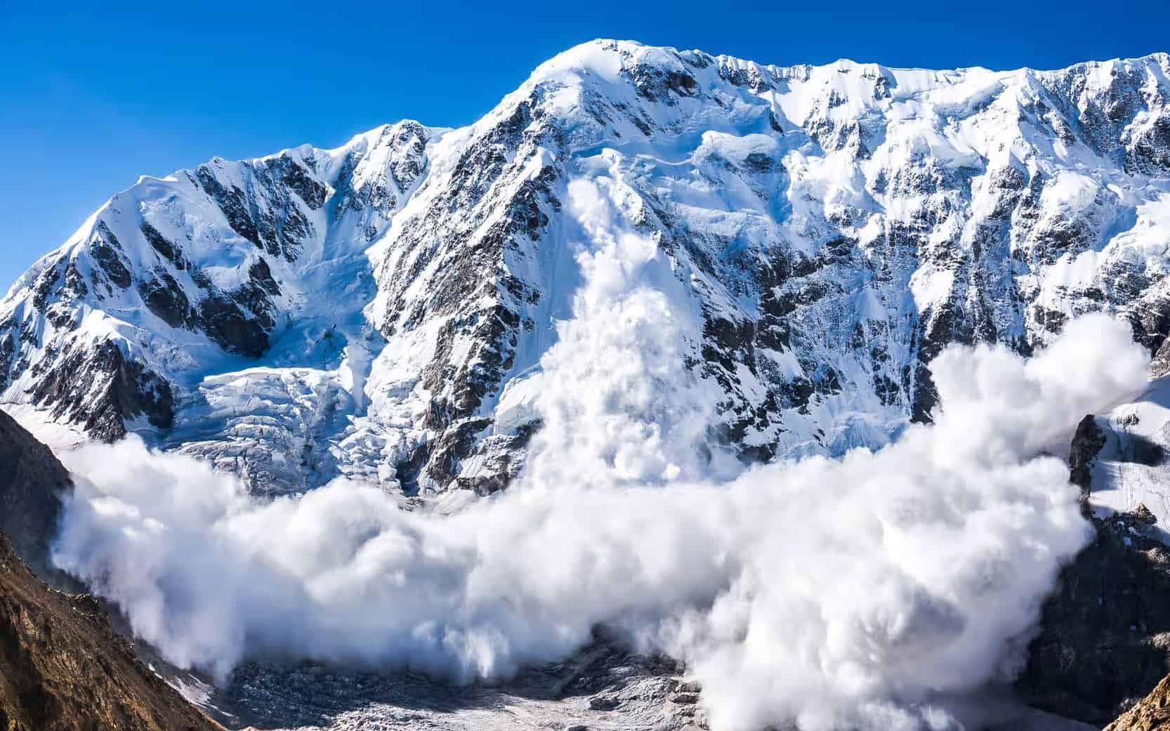 An avalanche thunders down a mountain in France