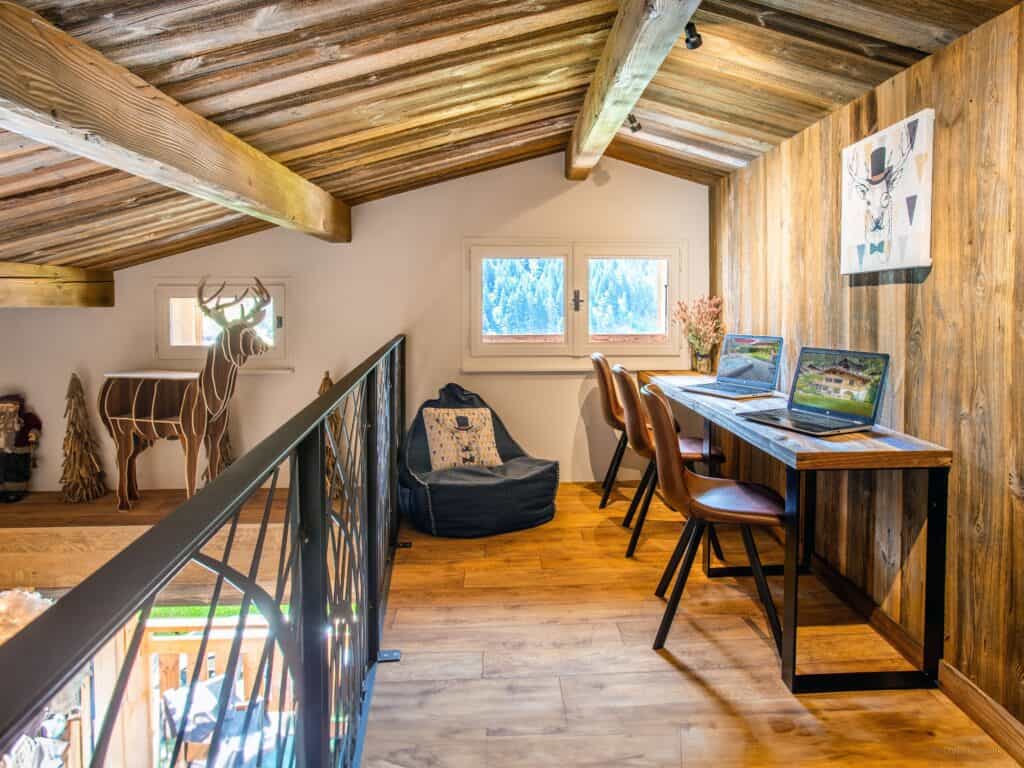 Work bench with laptops on a mezzanine