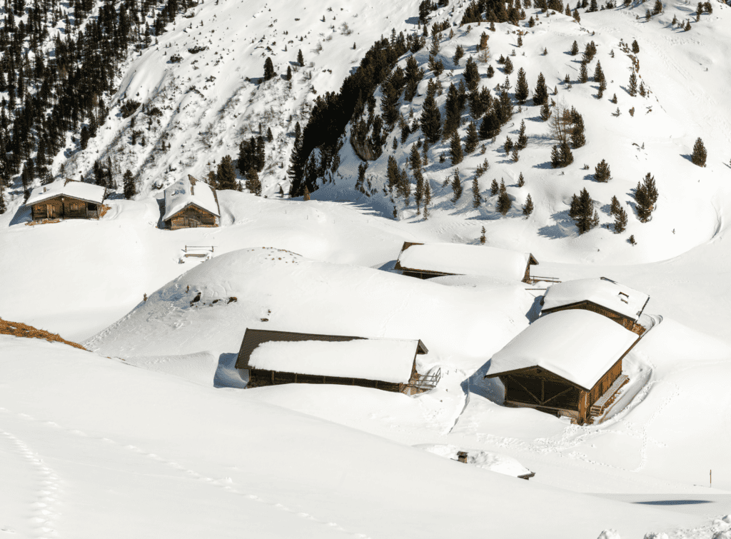 A mountain village covered in deep snow