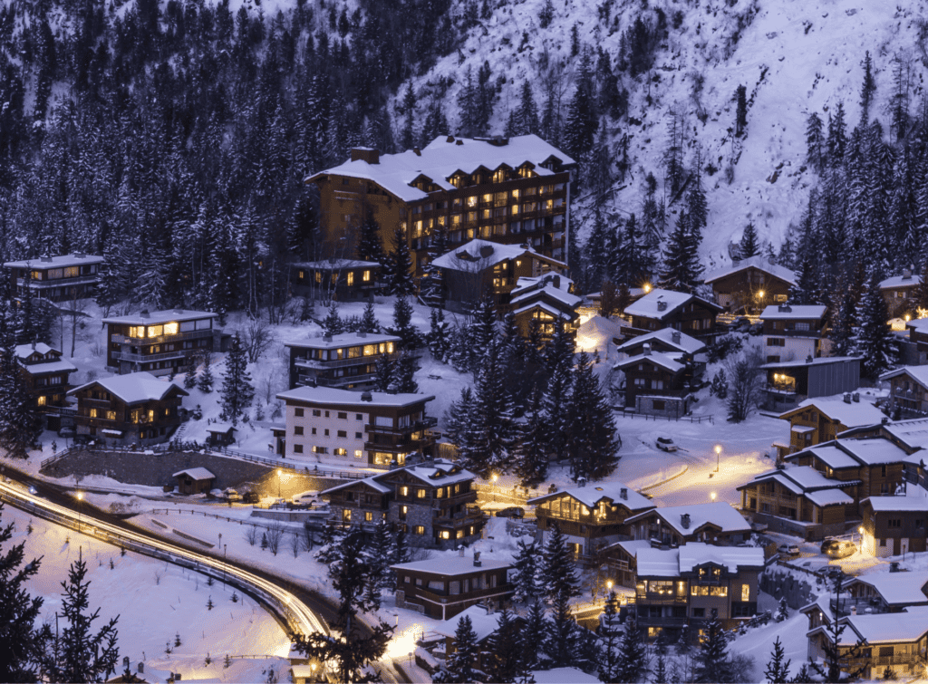 A bird's eye view of a mountain  village at night