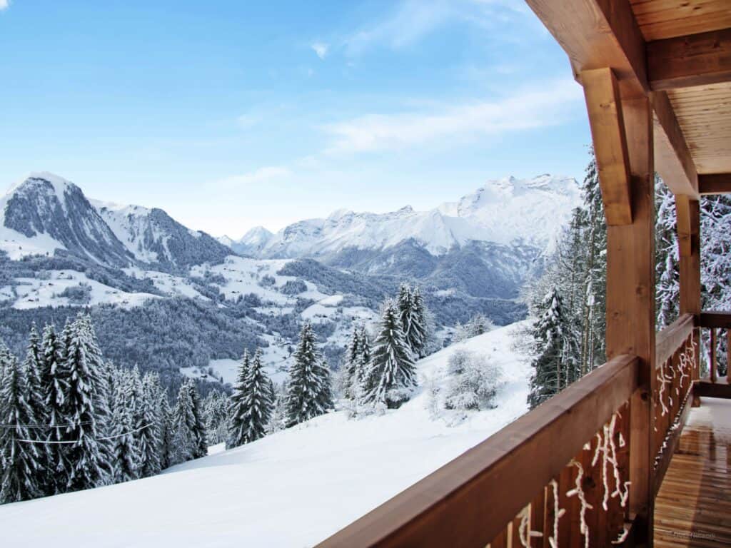 A view of the mountains from the balcony of a chalet