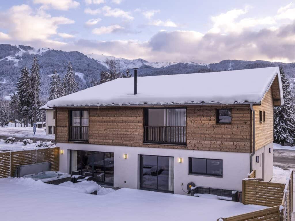 A modern, detached chalet on the edge of a village